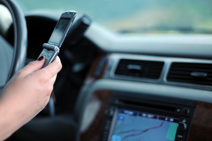 PENALTIES DOUBLE FOR USING MOBILES WHILE DRIVING
